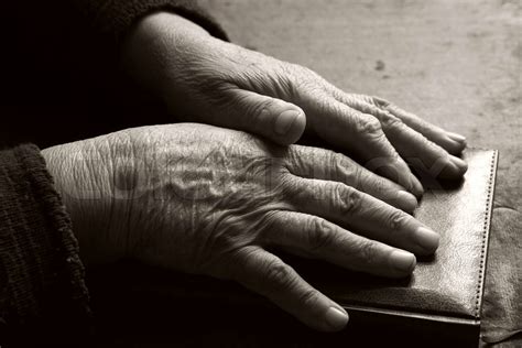 Image Of Old Hands On The Bible Stock Image Colourbox