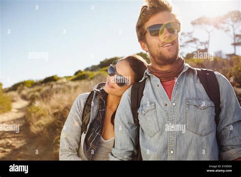 Portrait Of Young Couple In Love On Hike Young Beautiful Couple Hikers In Their Twenties On