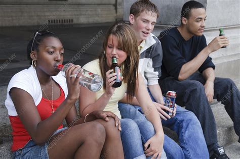 Group Of Teenagers Drinking Stock Image C0466244 Science Photo