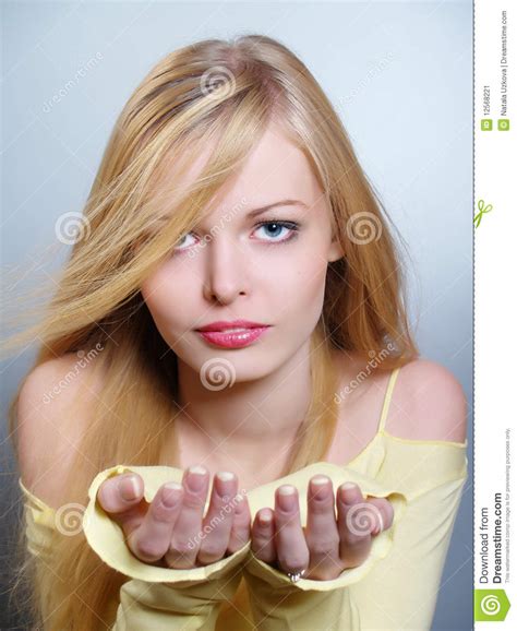 Beautiful Girl With A Flying Blonde Hair Stock Image