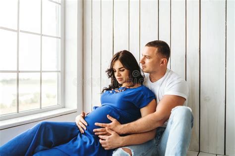 Cute Pregnant Woman With Her Happy Husband Stock Photo Image Of
