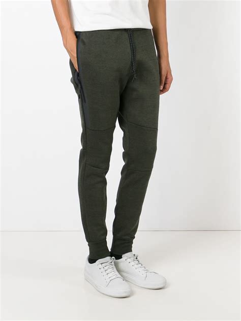 Nike Tapered Track Pants In Green For Men Lyst