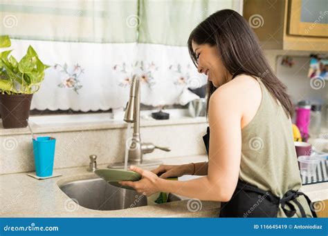 Side View Of Woman Washing Utensils Stock Image Image Of Latin Home
