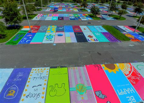 High School Students Encouraged To Paint Their Parking Spots Be More