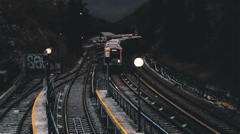 2048x1152 Train Railways Dark Evening Photography Wallpaper2048x1152