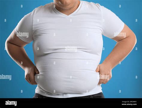Fat Man In Blue Shirt Hi Res Stock Photography And Images Alamy