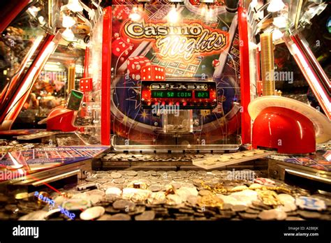 Coin Pushing Cascade Machine In The Amusement Arcades On Brighton Pier
