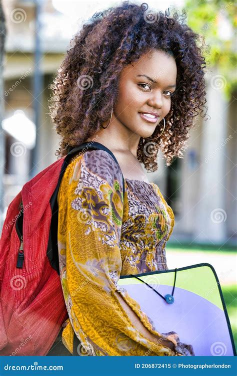 Portrait Of Beautiful African American Female College Student On Campus