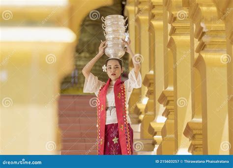 Young Girl With Traditional Burmese Holding Bowl Of Rice On The Hand At