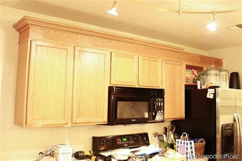 How can i update my kitchen cabinets without replacing them? Update Builder Grade Cabinets Fast Without Painting