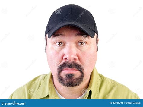 Portrait Of Staring Man Wearing Baseball Cap Stock Photo Image Of