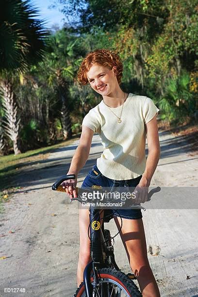 Redhead On Bike Photos Et Images De Collection Getty Images