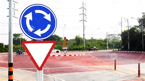 Traffic Sign Roundabout Before Circular Intersection Or Junction Stock