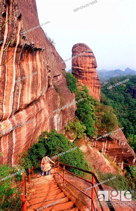 China Visitors Climbing In Danxiashan Mount Danxia North Of
