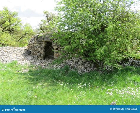 A Small Old Room Made Of Stones In A Greenfield Stock Image Image Of