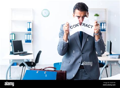 The Businessman With Heavy Paperwork Workload Stock Photo Alamy