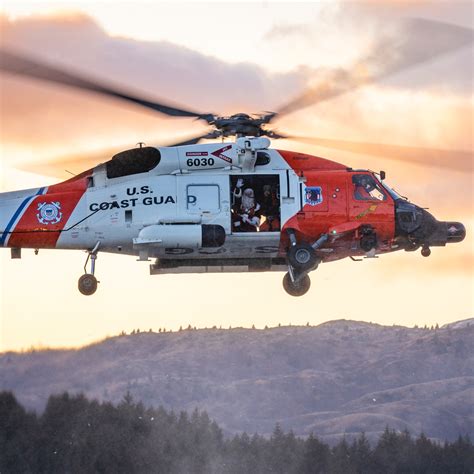 Santa Waves From An Mh 60 Jayhawk Helicopter As The Aircrew Lands At