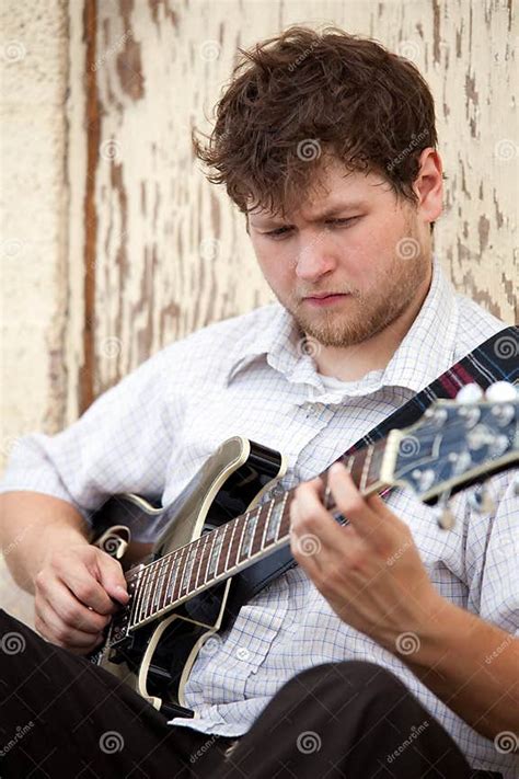Young Man Playing Guitar Outdoors Stock Photo Image Of Musical