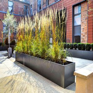 The black rectangular planter is well suited to contemporary outdoor. Source Hot Sale Square And Rectangle Large Outdoor ...
