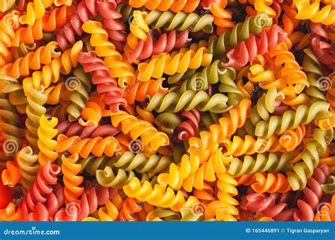 Uncooked Tricolore Fusilli Pasta Twist Shapes Background Stock Photo