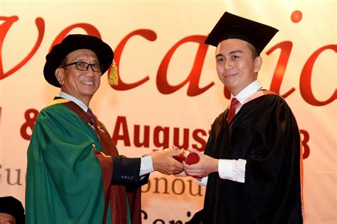 Study by the northeastern university. Datuk Lim presenting the scroll to Bachelor of Engineering ...