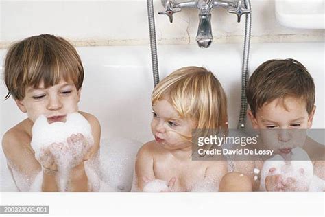 brother and sister taking a bath together photos and premium high res pictures getty images