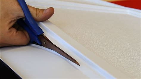I use a drywall square to cut straight/square lines. How to Cut Vinyl Ceiling Tiles - YouTube