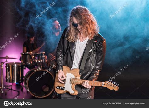 Rock Band On Stage — Stock Photo © Tarasmalyarevich 150798734