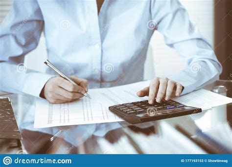 Bookkeeper Woman Or Financial Inspector Making Report Calculating Or