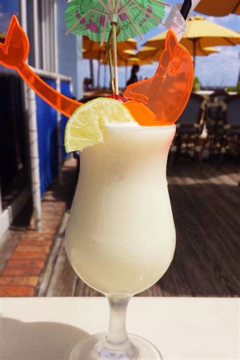 Shake and strain into a wine glass filled with crushed ice. Key Lime Pina Colada: Malibu coconut rum, Licor 43, lime ...