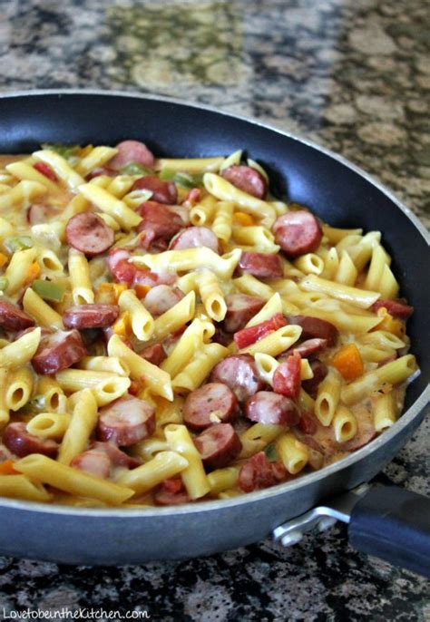 It features pasta, vegan sausage, and cheese. One Pot Cheesy Smoked Sausage Pasta - Love to be in the ...