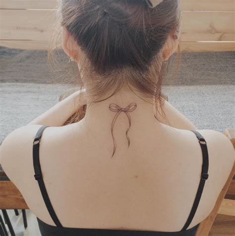 This exaggerated, forward rounding of the back is often caused by osteoporosis in older women. 80 Awesome Back Neck Tattoo Ideas For Women - Gravetics