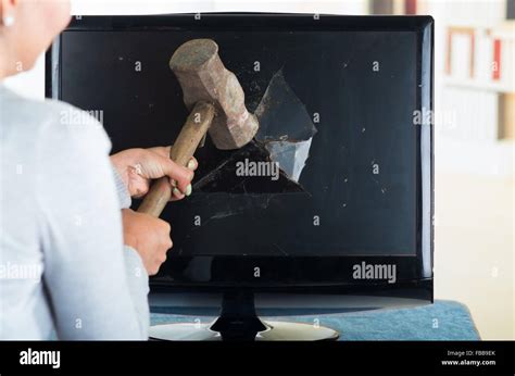 Woman Smashing Laptop Hammer Hi Res Stock Photography And Images Alamy