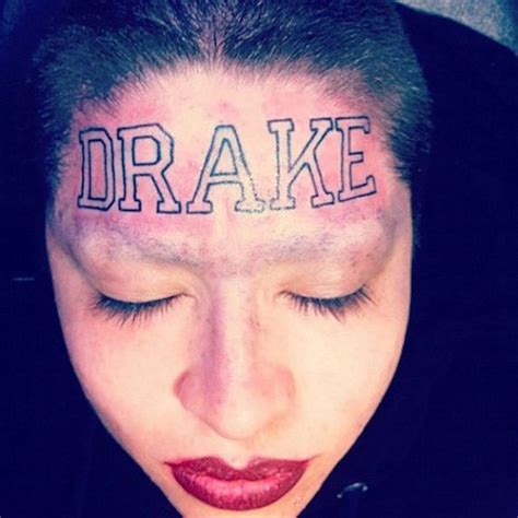 Bold Lettering Name Tattoo On Women Forehead