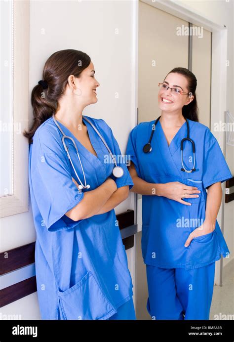 Two Female Medical Nurses In The Hospital Hallway Stock Photo Alamy