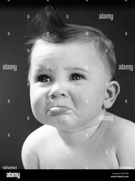 1940s 1950s Sad Baby With Pouting Lower Lip Extended About To Cry Stock