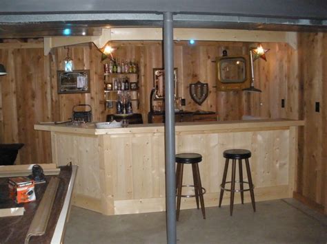 How cool would that be to hide a man cave? Rustic Basement Bar Design With Unfinished Pine Wood Bar ...