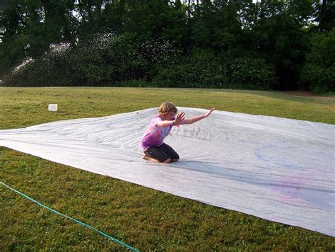 140 feet long redneck slip and slide for david's 17th birthday. 50 foot slip n slide Made with 25ft pieces of plastic duct ...