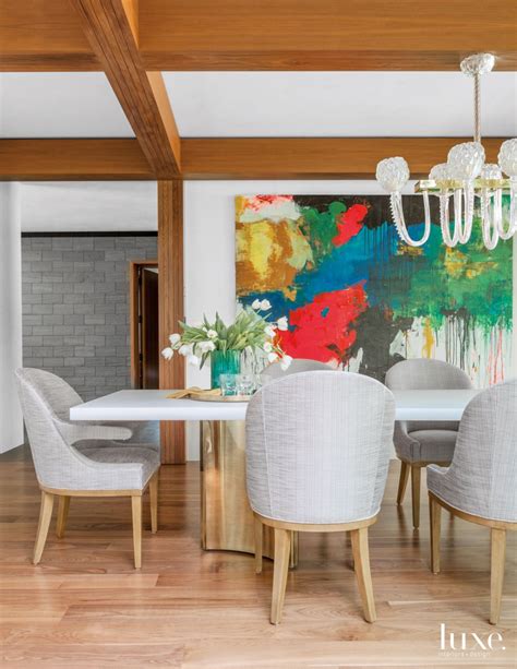 Modern Neutral Dining Room With Dramatic Artwork Luxe Interiors Design