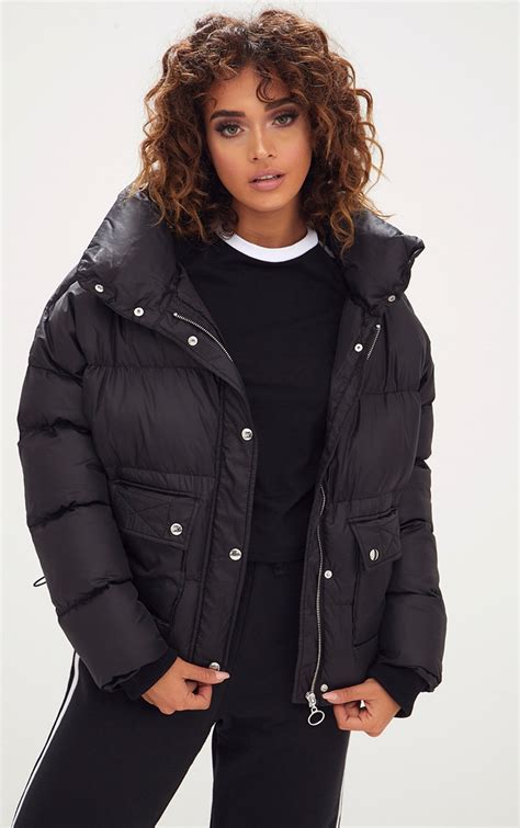 Black Oversized Puffer Jacket With Button Pockets Prettylittlething Usa