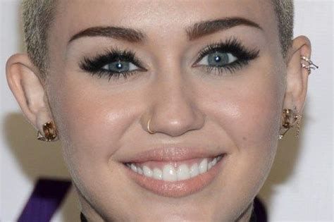10 Best Known Miley Cyrus Piercings Body Art Guru