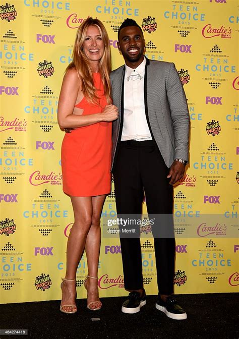 Tv Personality Cat Deeley And Recording Artist Jason Derulo Pose In