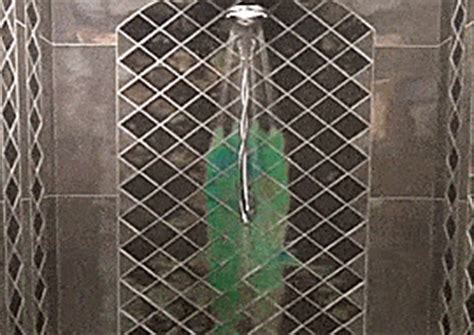 Rather modern bathrooms use colorful tiles to draw attention to a focal point. This Shower Tile Changes Color Depending On The ...