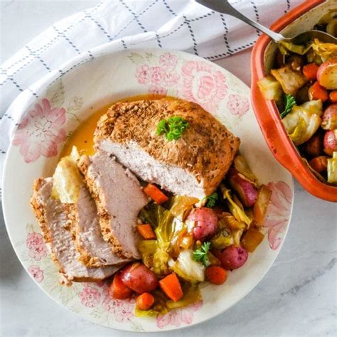 Place tenderloin into the bottom of a roasting pan. Oven Roasted Pork Loin with Cabbage and Potatoes - Upstate ...