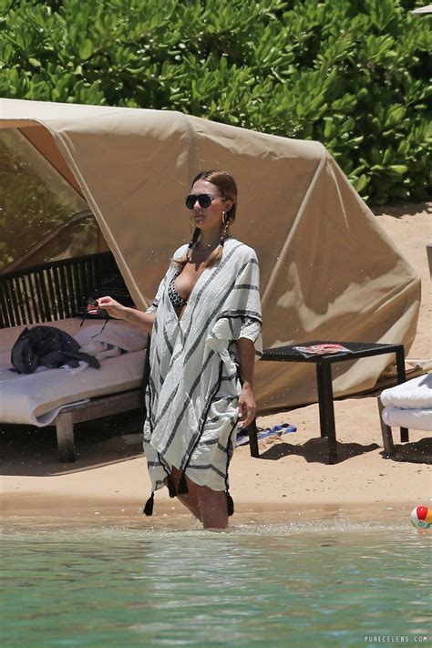 Jessica Alba Caught Sunbathing In The Bikini On A Beach
