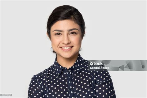 Headshot Portrait Of Millennial Indian Girl Posing In Studio Stock