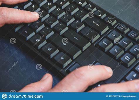 Close Up Of Typing Man S Hands On Black Keyboard Hand Writing