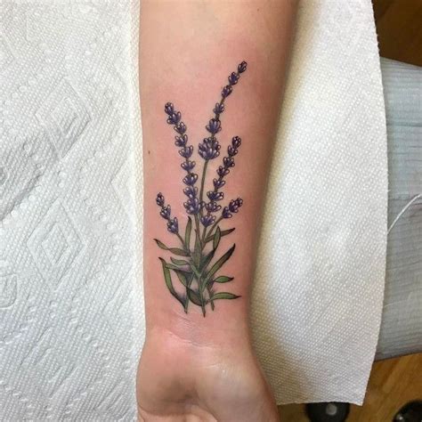 It's a huge tattoo that takes up her whole thigh. Image result for lavender flower tattoo designs | Lavender ...