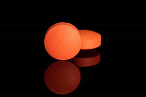Round Orange Pill Stock Photos Pictures And Royalty Free Images Istock