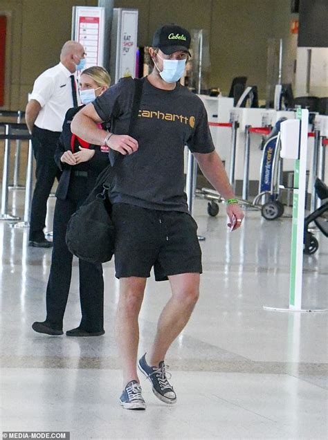 Netflixs Sexlife Actor Adam Demos Covers Up At Sydney Airport Daily
